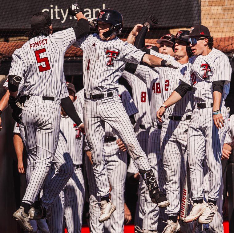 Texas Tech baseball team celebrating on the field